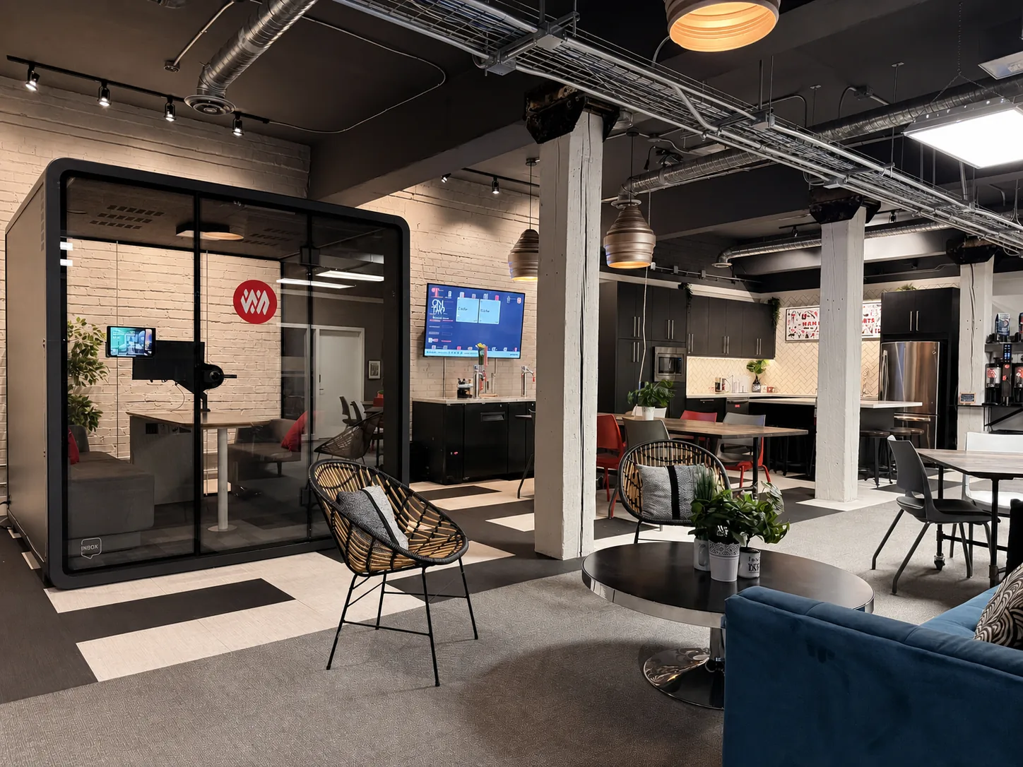 A call booth beside the lounge and kitchen at Westcoast