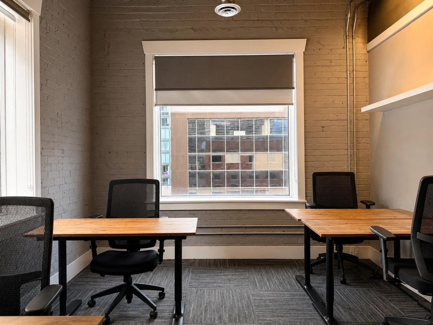 An office with two desks beside a window at Westcoast